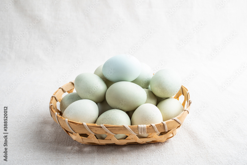 A plate of green-shelled ebony eggs