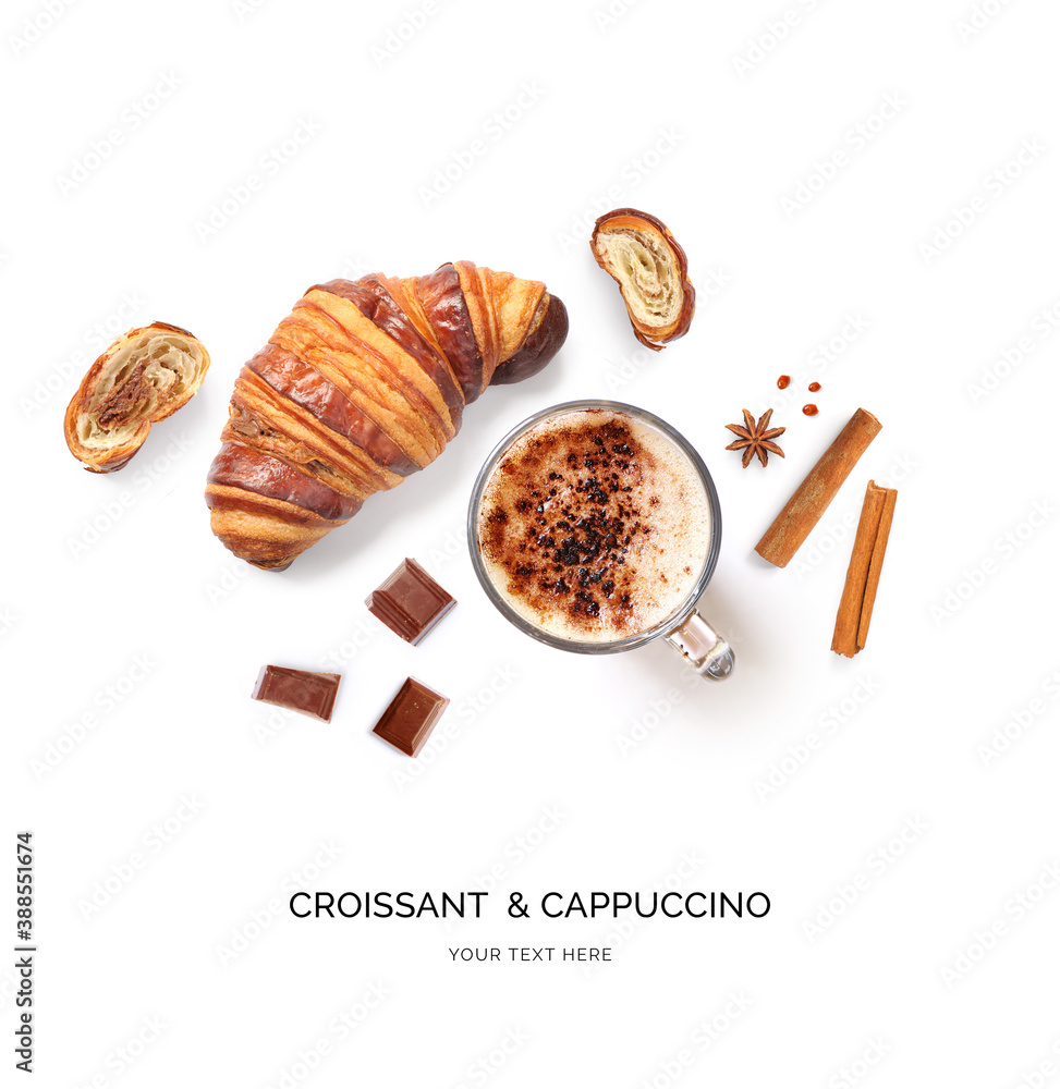 Creative layout made of croissant and cappuccino on the white background. Flat lay. Food concept. Ma