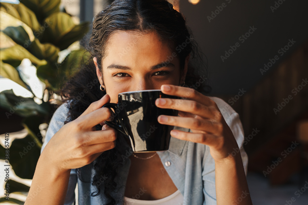 Woman having a cup of coffee