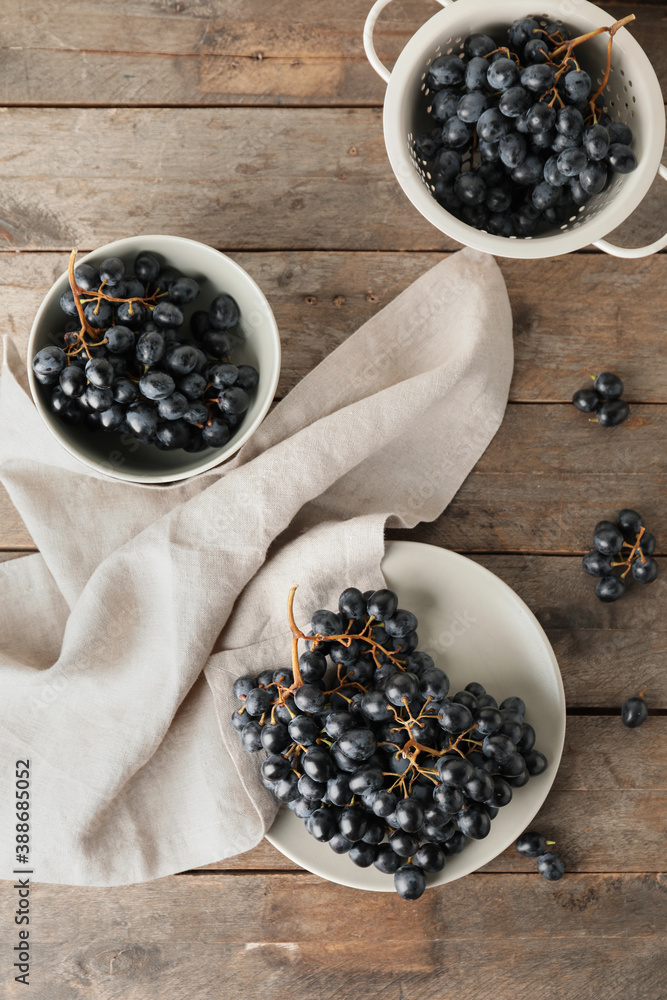 Composition with sweet ripe grapes on table