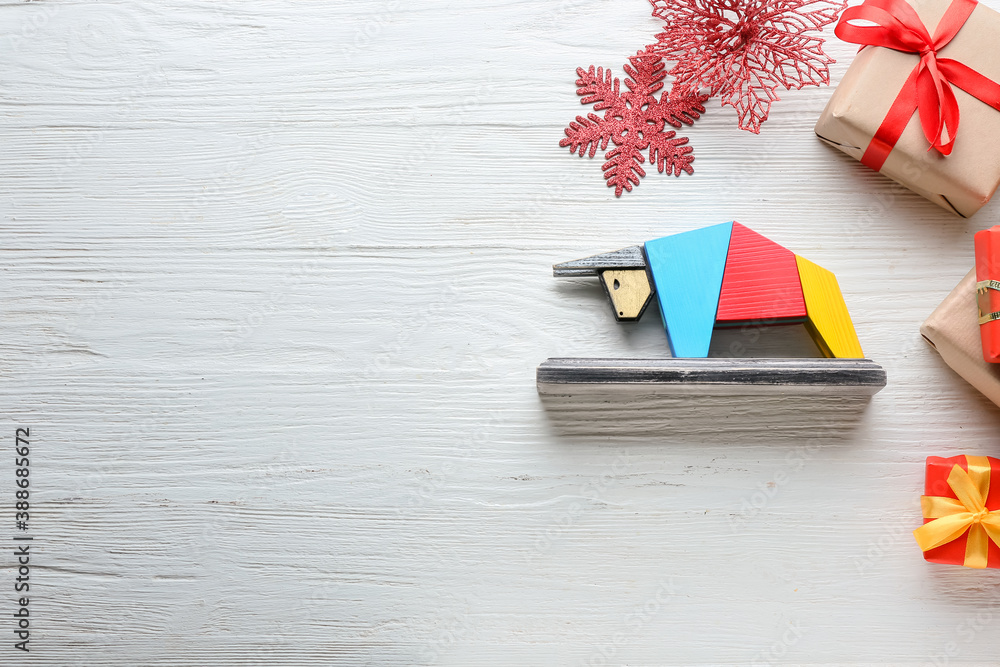 New Year composition with figurine of bull on wooden background