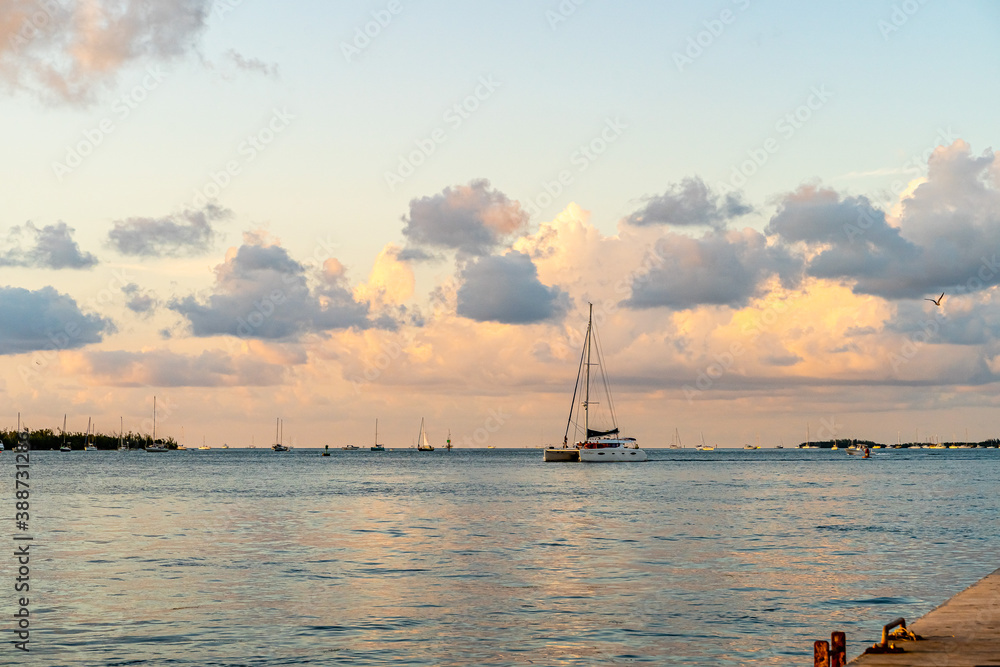 Sunset, view of Sunset y Island from Mallory Square, Key West, Florida, US