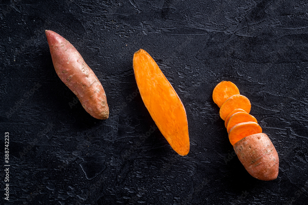 Flat lay of sweet potatoes - yams vegetables, top view