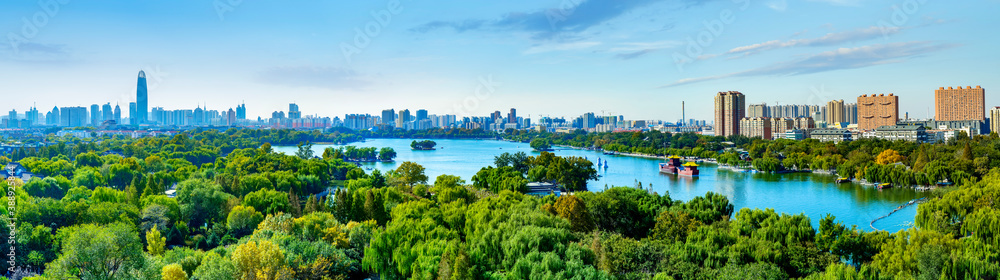 Jinan Daming Lake Park and city skyline