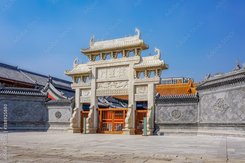 The gate of the Chinese stone archway in the ancient city of Jimo, Qingdao