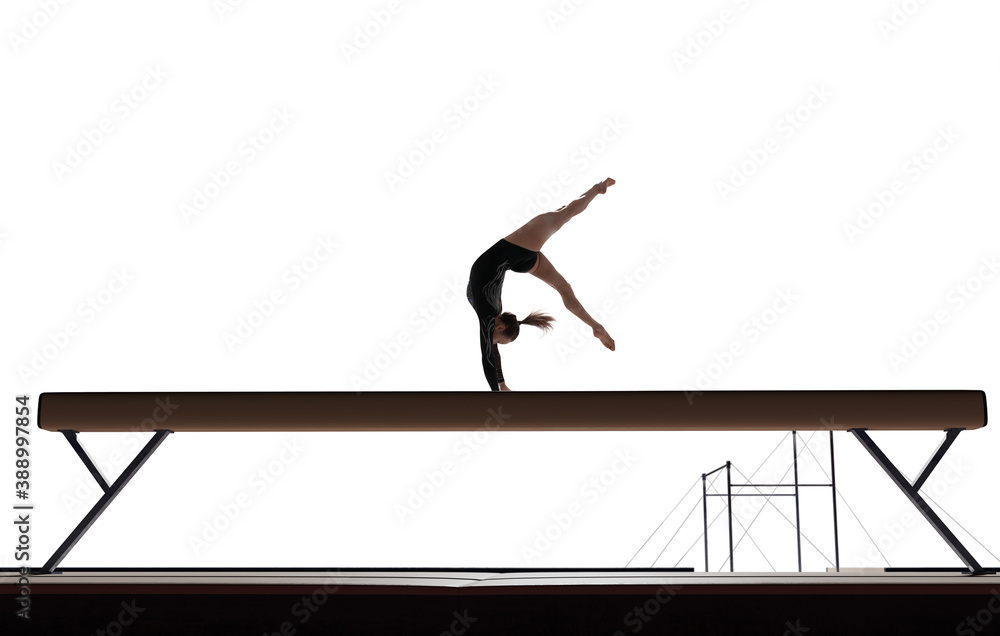 Female gymnast doing a complicated trick isolated on white.