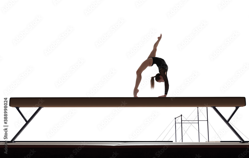 Female gymnast doing a complicated trick isolated on white.