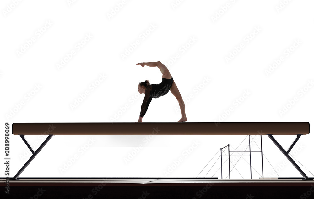 Female gymnast doing a complicated trick isolated on white.