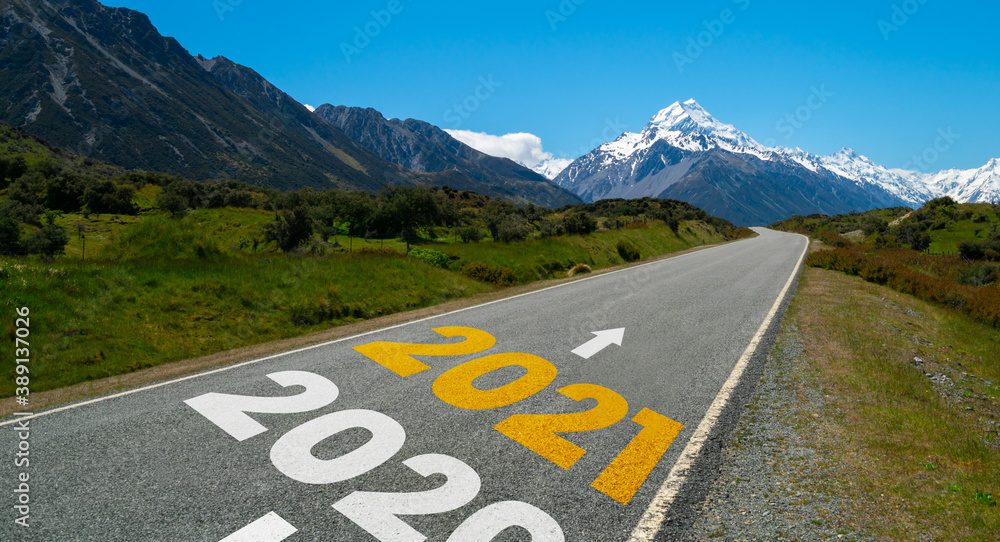 2021 New Year road trip travel and future vision concept . Nature landscape with highway road leadin