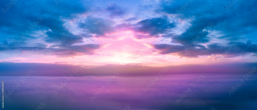 Purple paradise sunrise above the clouds, panorama