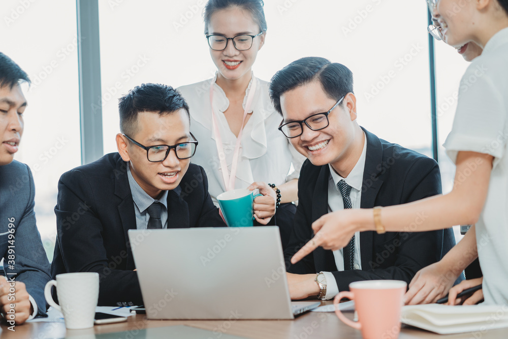 Business team leader presents to employees about upcoming work plans
