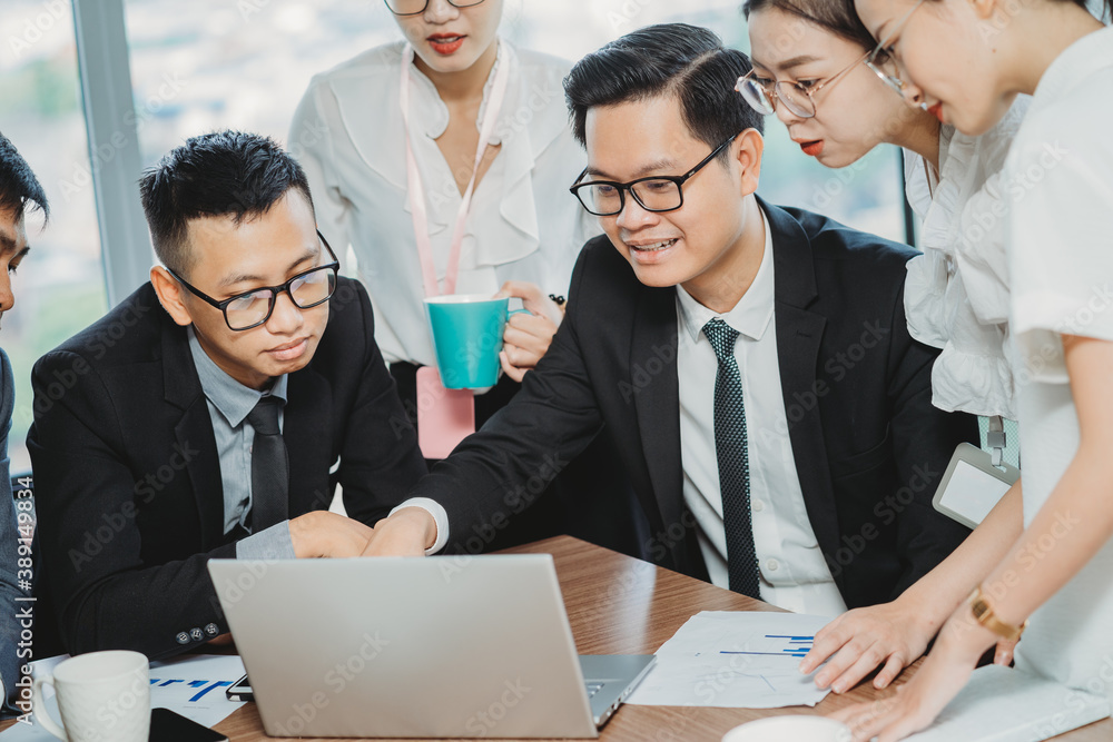 Business team leader presents to employees about upcoming work plans
