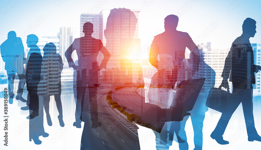 Abstract image of many business people together in group on background of city view with office buil