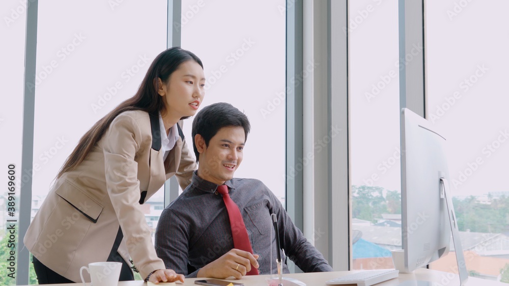 Two business people talk project strategy at office meeting room. Businessman discuss project planni