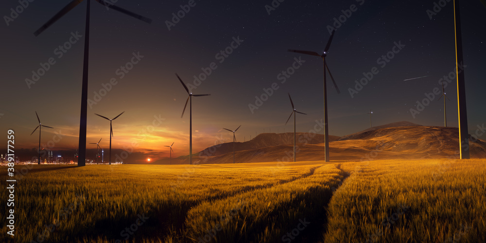 Beautiful sunset field with wind mill generators. big city in background