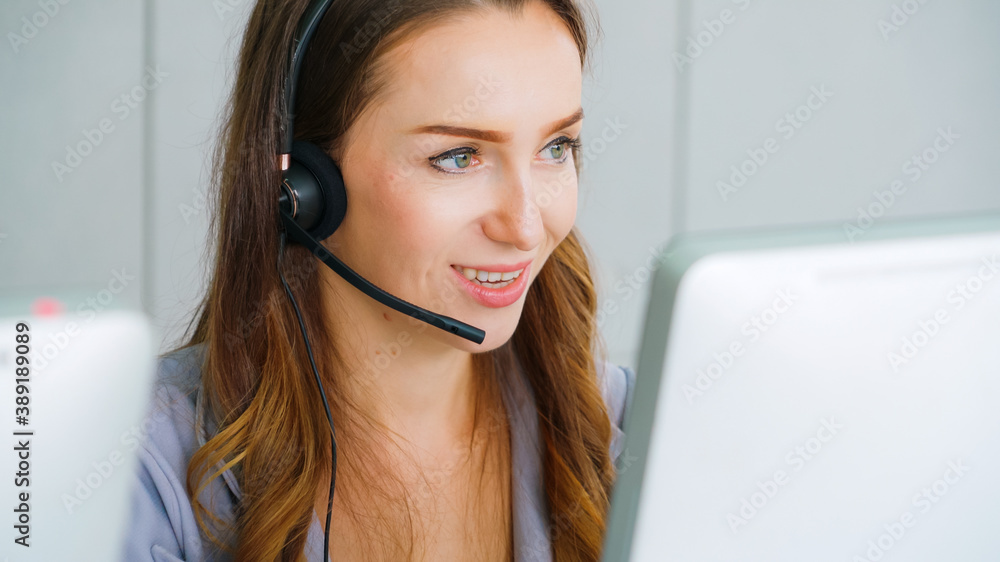 Business people wearing headset working in office to support remote customer or colleague. Call cent