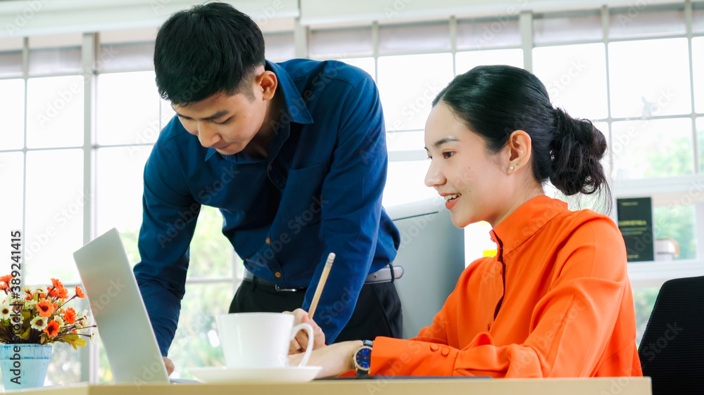 Two business people talk project strategy at office meeting room. Businessman discuss project planni