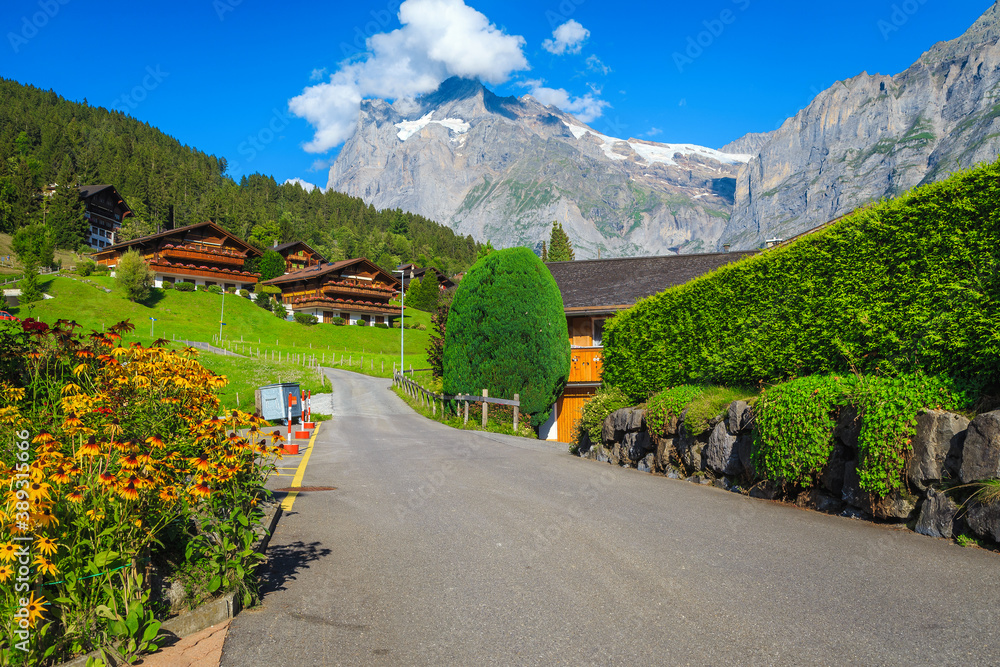 Cozy street in the beautiful alpine village, Grindelwald, Switzerland