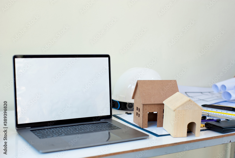 Architects concept and a desk with a laptop.