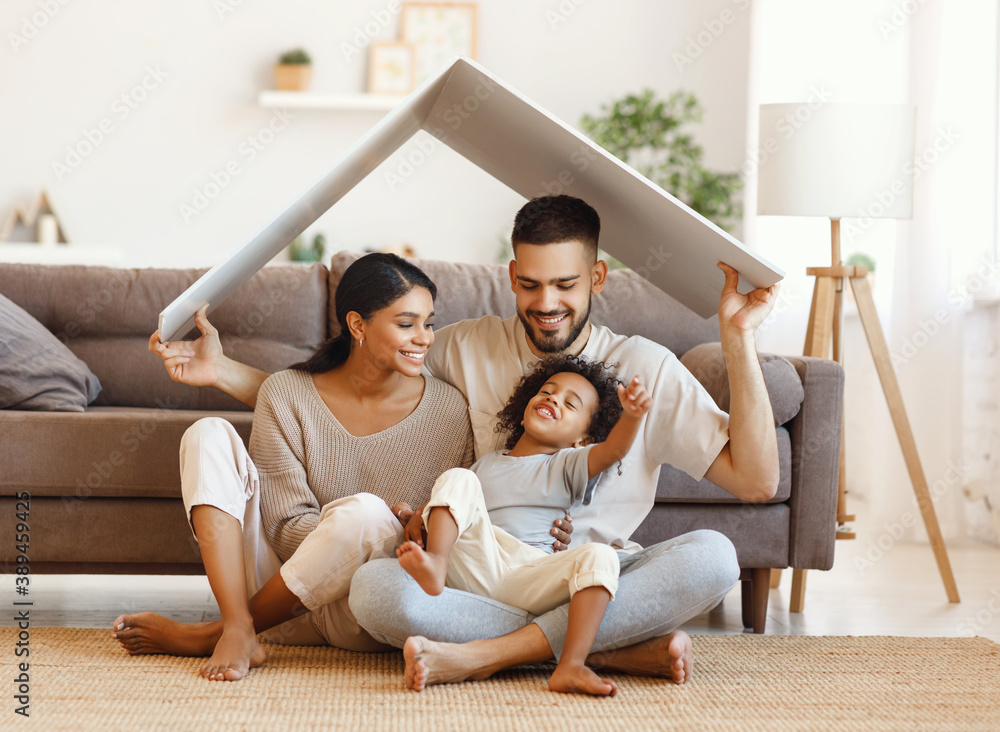 Happy multiethnic family under roof.