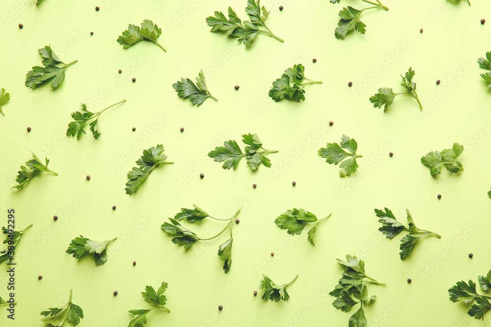 Fresh parsley and spices on color background