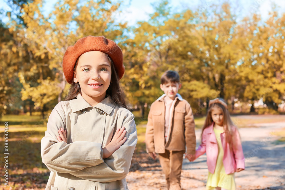 Cute little children in autumn park