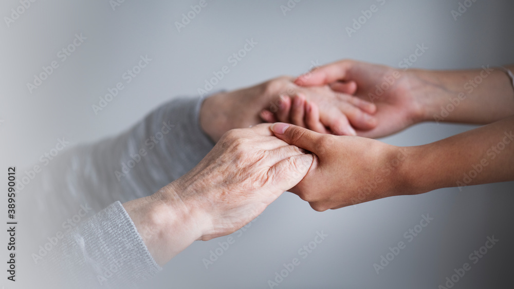 Daughter assisting her sick mother