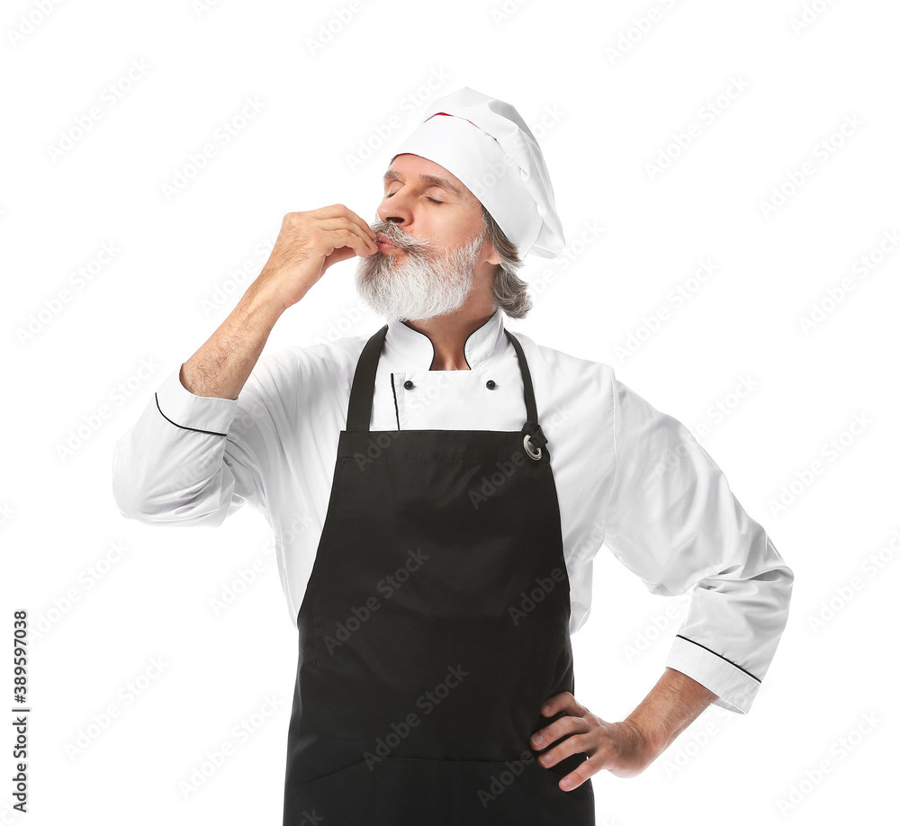 Mature male chef on white background