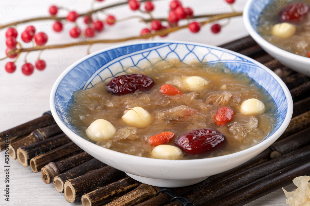 Close up of sweet snow white fungus soup with lotus seed, Chinese red dates and wolfberry.