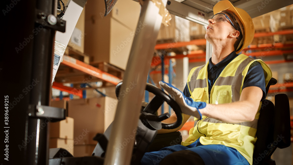 Retail Warehouse full of Shelves with Goods: Electric Forklift Truck Operator Lifts Pallet with Card