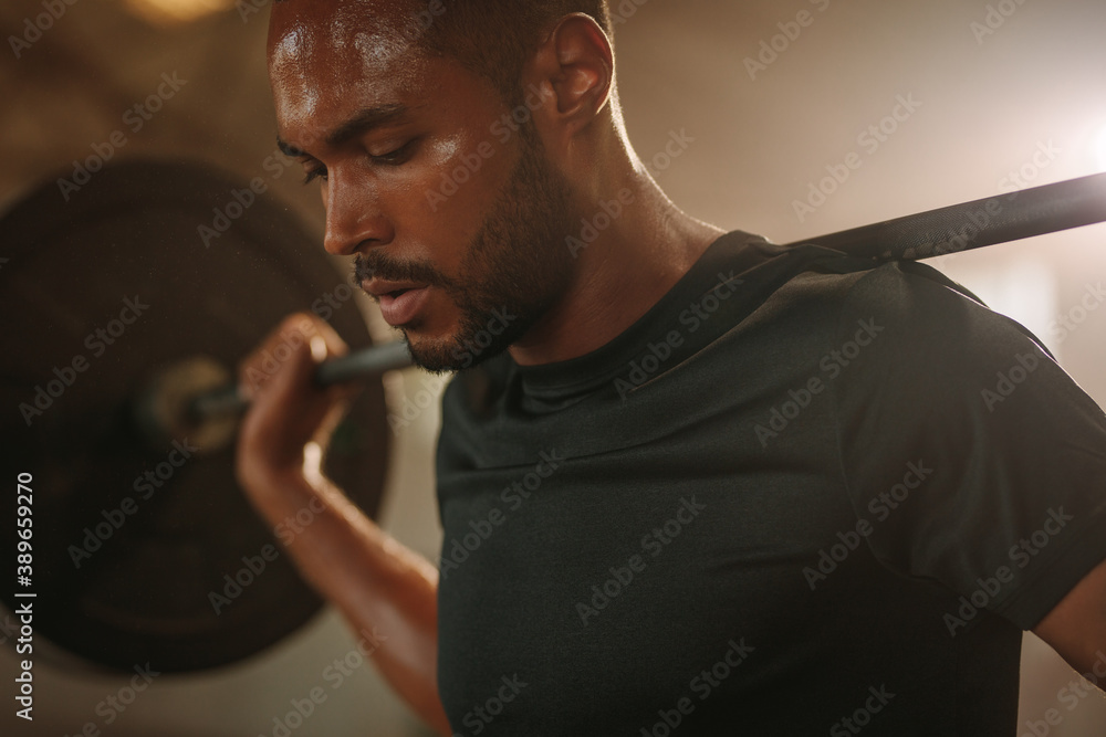 Man working out with heavy weights