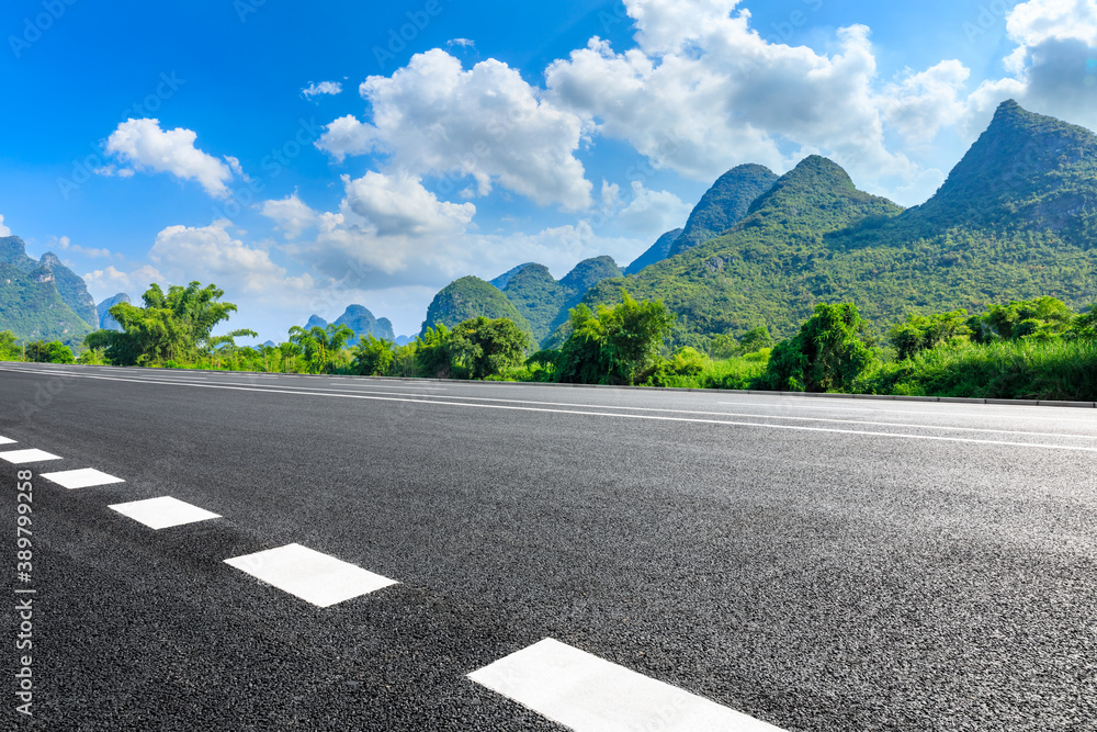 Asphalt highway and green mountain natural scenery in Guilin,China.