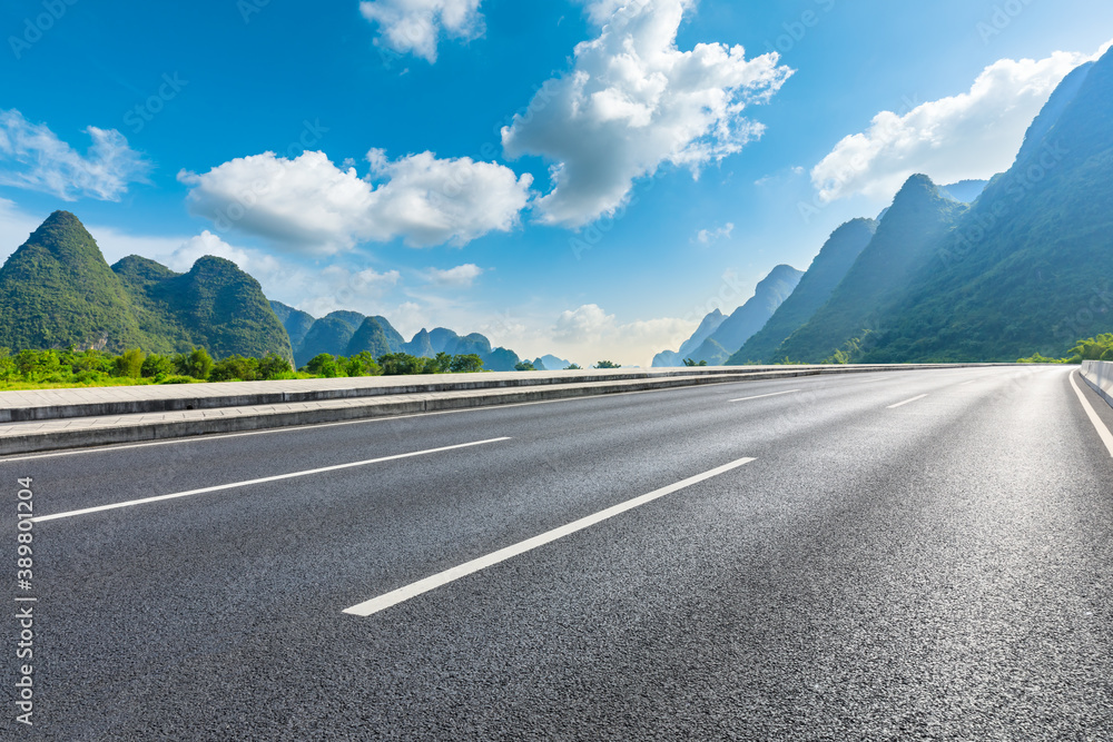 Asphalt highway and green mountain natural scenery in Guilin,China.