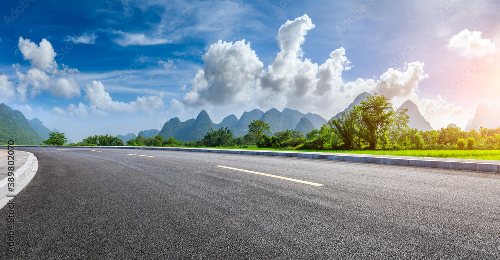 Country asphalt road and green mountain natural scenery in Guilin,China.