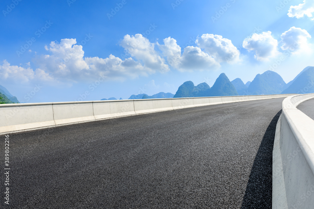 Asphalt highway and green mountain natural scenery in Guilin,China.