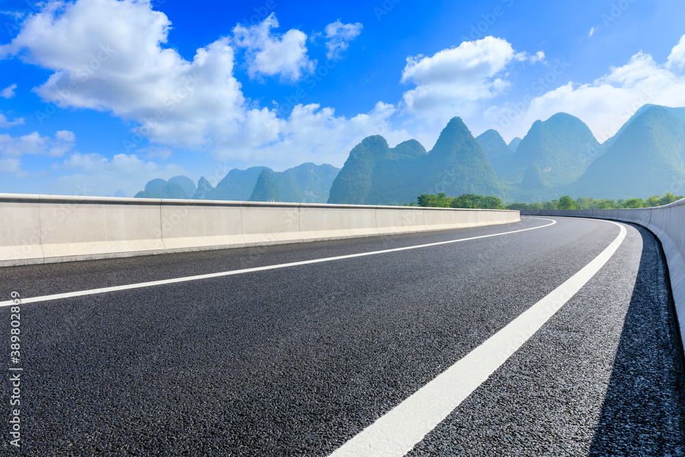 Asphalt highway and green mountain natural scenery in Guilin,China.