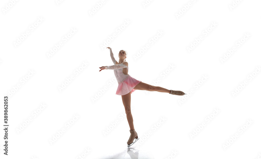 Figure skating girl in ice arena isolated on white.