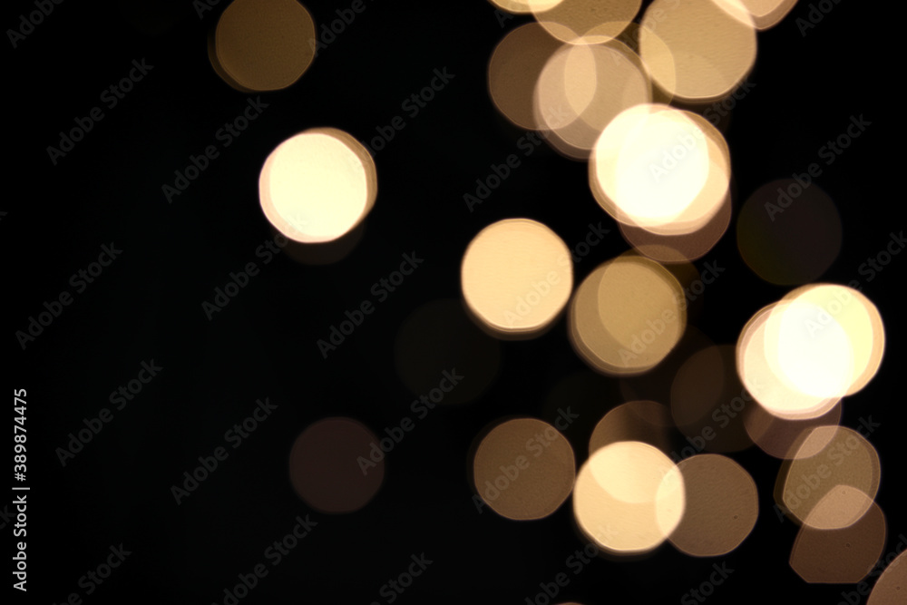 Dark abstract background with blurred lights