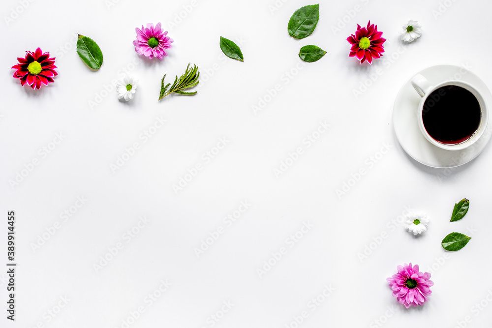 Cup of americano and flowers on white table top view mock-up