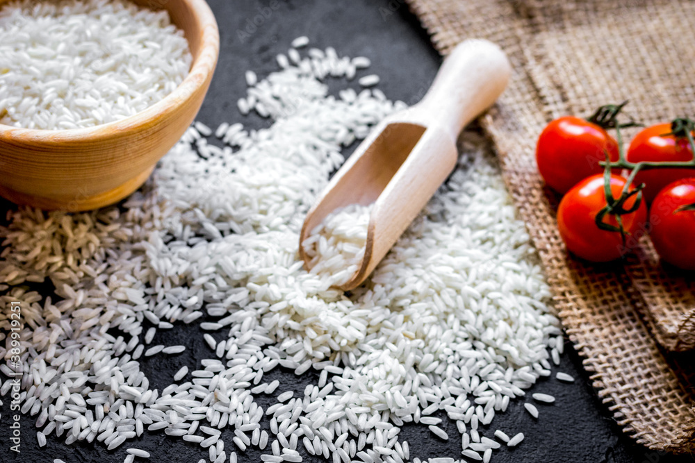 ingredients for paella on dark background