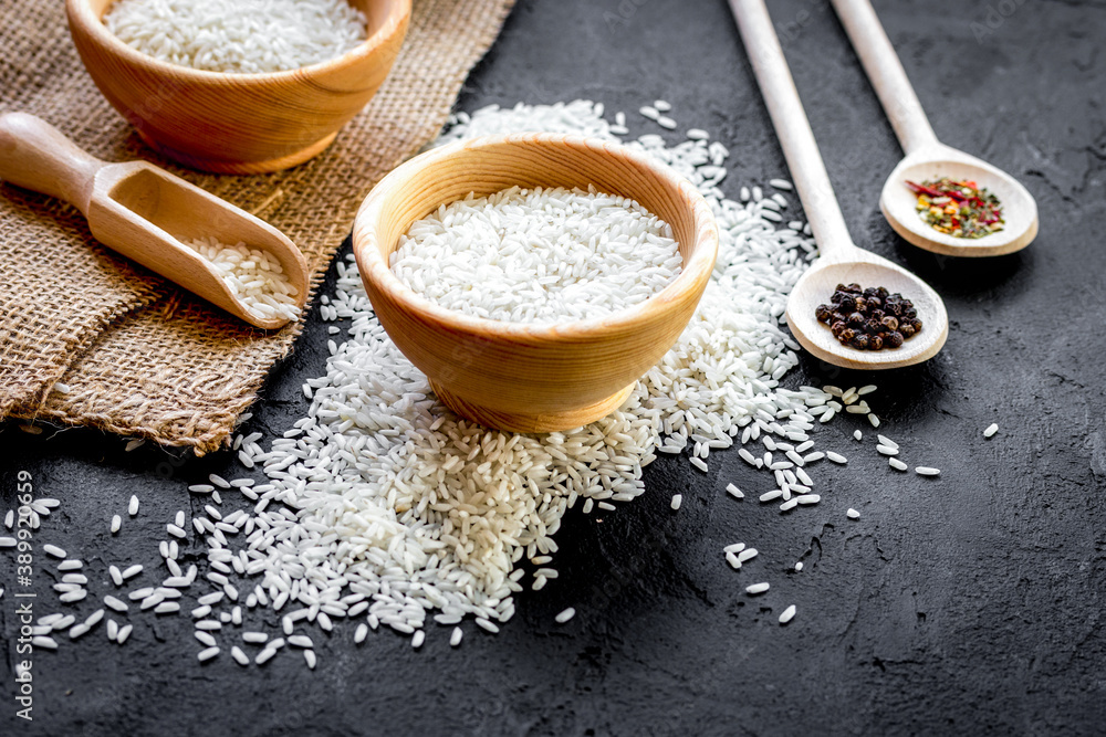 ingredients for paella on dark background