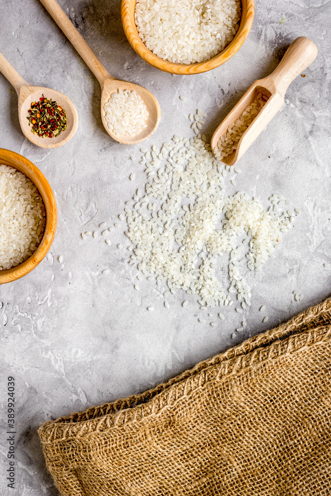 rice for paella on stone background top view mock up