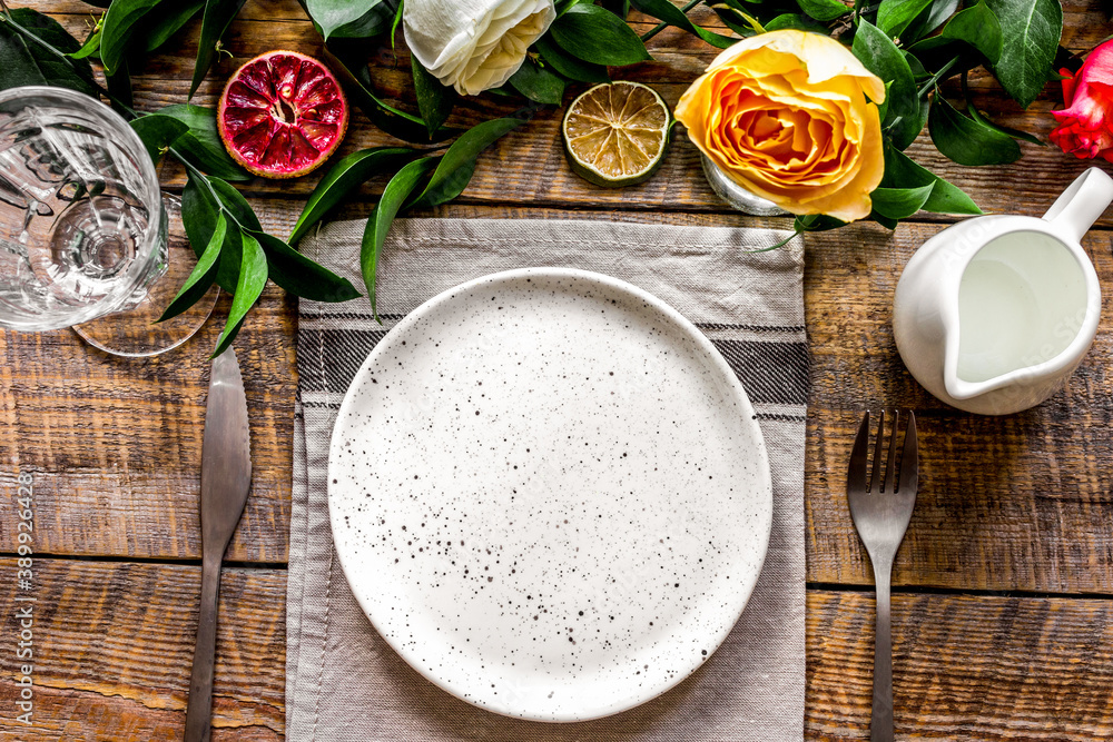 ceramic tableware top view on wooden background mock up