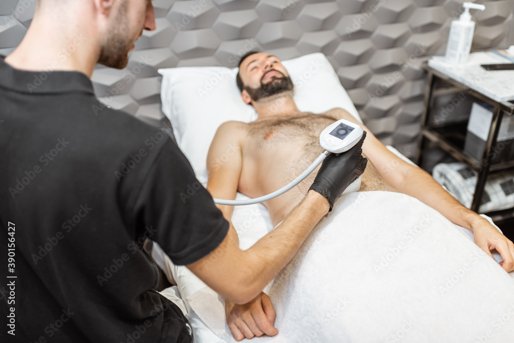 Ultrasound liposuction procedure for a male client