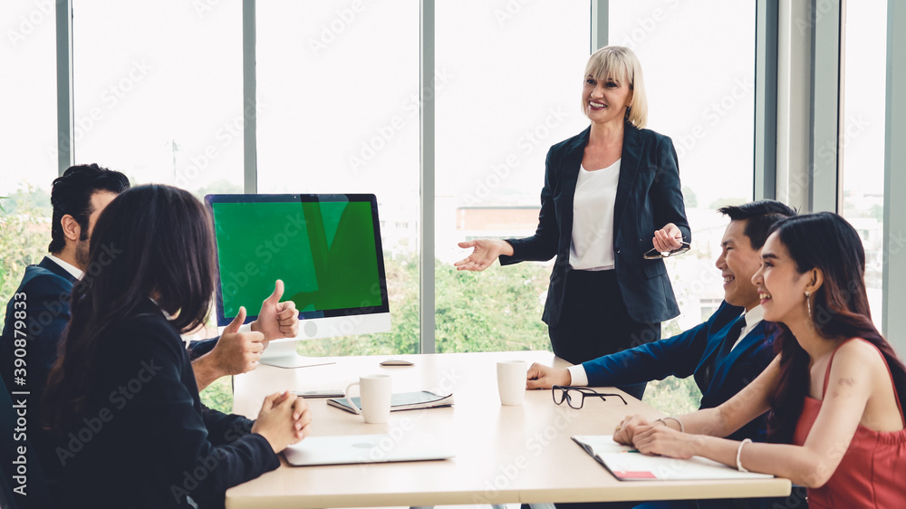 Business people in the conference room with green screen chroma key TV or computer on the office tab