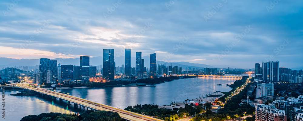 Early morning scenery of CBD cities along Min River in Fuzhou, Fujian, China