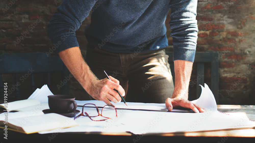 Male architect sketching