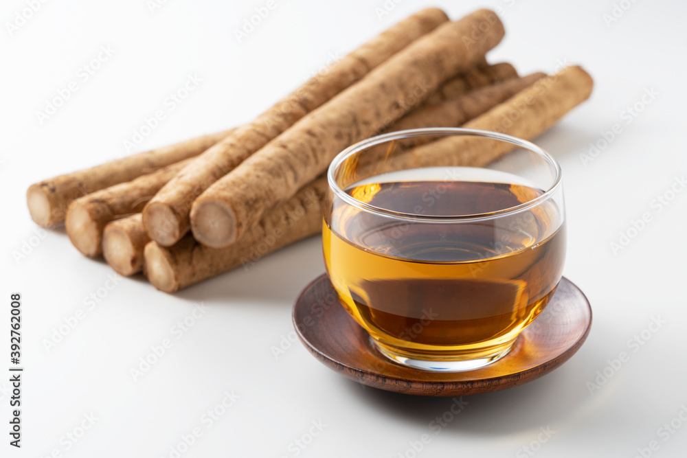 Burdock tea on a white background