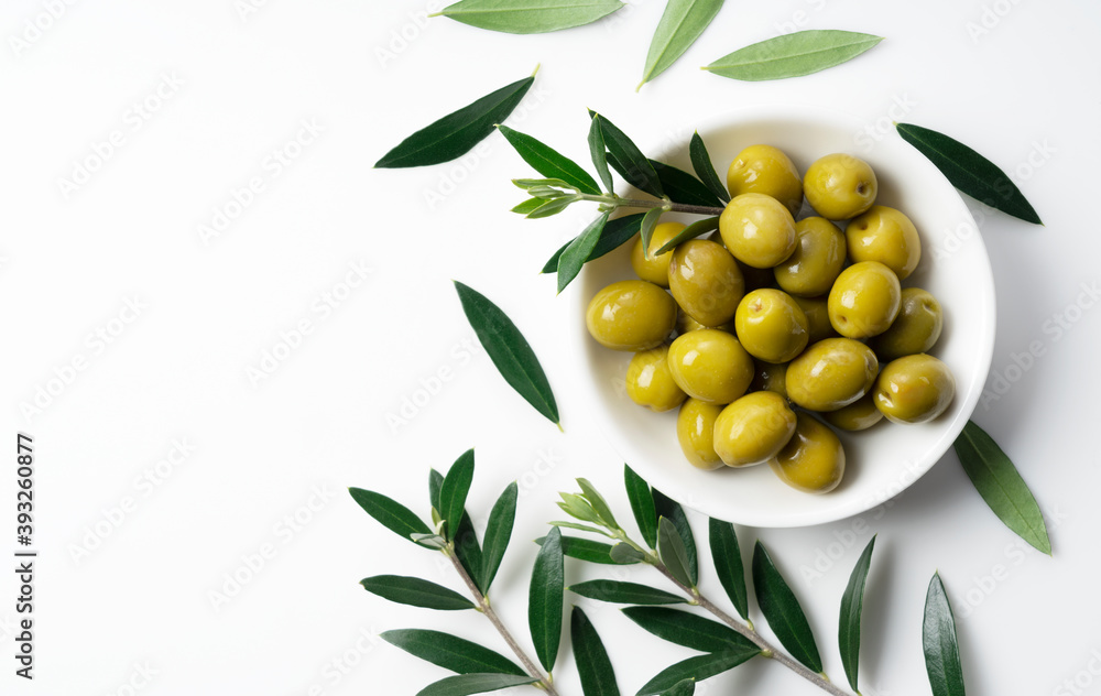 Salted olives placed on a white background