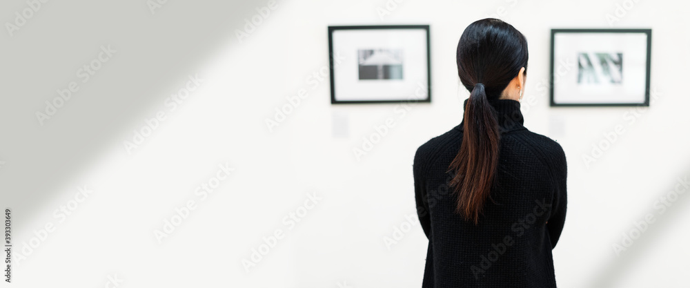 Asian woman in an art exhibition